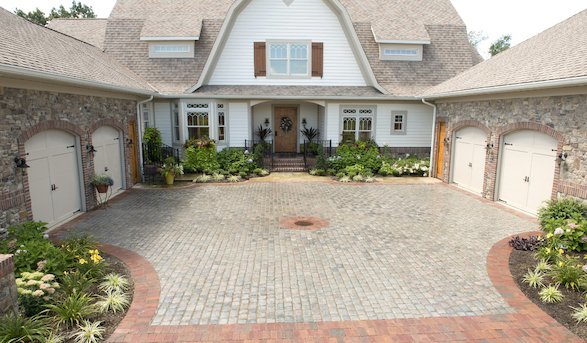 The home’s completed cobblestone driveway