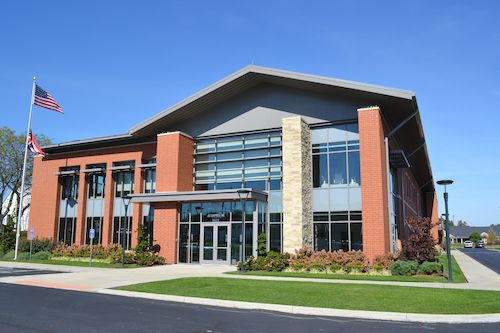 Front of commercial office building with landscape design in place